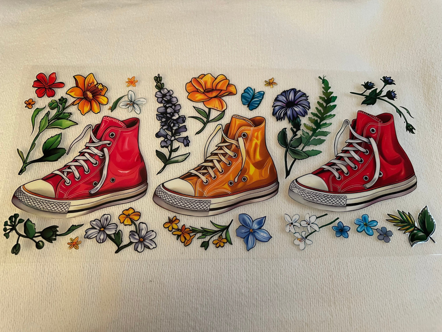 red and orange chucks with flowers